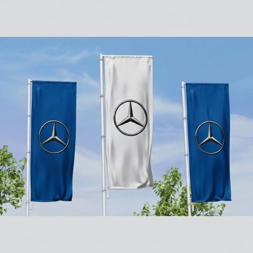 Three rectangular car dealership flags displayed on poles